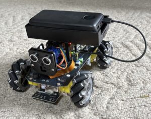 AI-powered Raspberry Pi 5 robot with mecanum wheels for versatile movement and automation.